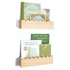 two wooden bookshelves with children's books on them