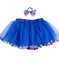 Pom Pom Tutu Skirt For Girls 0-8years. Who Says You Can Only Dress Up For One Day Out Of The Entire Year? With The Right Accessories Your Sweet Girl Can Transform Into A Confetti Cupcake Princess! Simply Have Her Slip Into This Too-Cute Tutu With Colorful Pom Poms. A Soft Underlining Beneath Layers Of Tulle Ensures That Even Babies And Toddlers With Sensitive Skin Can Play All Day Long. Colorful Pom Pom Balls Give The Tulle Skirt Its Fun Confetti Look. A Snug But Comfortable, Stretchy Elastic Ba Blue Tutu Skirt, Pom Pom Tutu, Tutu Material, Pom Pom Skirts, Blue Tulle Skirt, Pom Pom Balls, Bow Hair Tie, Tutu Skirt Kids, Blue Tutu