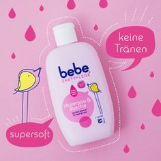 a bottle of bebe shampoo sitting on top of a pink background