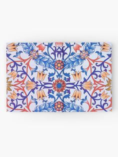 a blue and orange floral design on a white background