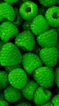 a close up view of green gummy bears