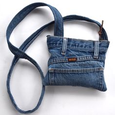 Handmade From An Upcycled Pair Of Rustler Jeans. Exposed Zipper With Genuine Leather Pull Tab. One Outer Pocket. Fully Lined With A Smooth Synthetic Fabric. Measures 7.5" Wide X 6.5" Tall. 49” Strap Diy Jeans Bag Tutorial, Blue Jean Purses, Rustler Jeans, Jeans Rosa, Denim Bag Patterns, Jean Purses, Denim Backpack, Denim Bags, Blue Jeans Crafts