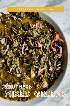 a white bowl filled with cooked greens on top of a marble counter next to the words southern mixed greens