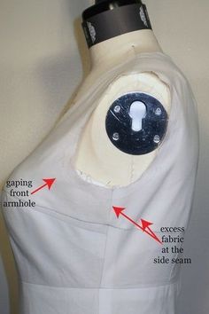 the back of a mannequin's torso with instructions on how to sew