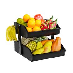 two tiered trays filled with different types of fruit