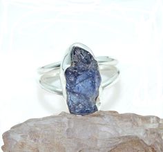 Tanzanite Rough Natural Gemstone 925 Sterling Silver Ring, Gift for Her, Raw Gemstone, Handmade, One of Kind, December Birthstone Gem, Ring Size-8US, Ship From USA Gemstone: - Tanzanite Material: - 925 Sterling Silver Weight: - 6.30gm Stone Size: -17x10 MM Free Natural Stone Shape: - Natural Free Shape Ring Size: - 8us We use natural gemstones; each piece of our jewelry is handcrafted and unique. Gemstones may have a subtle difference in color and formation. This is handcrafted Solid Sterling Silver jewelry. We guarantee the quality and the genuine properties of silver and the stone. Handcrafted nature inspired jewelry with an emphasis on comfort, high quality and unique designs. Each design is born through passion and love, and at the core represents the multicultural connection between p Birthstone Gems, Gem Ring, Nature Inspired Jewelry, December Birthstone, Unique Gemstones, Raw Gemstones, Rings Statement, 925 Sterling Silver Ring, Ring Gift