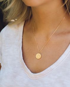 "While you can't use this coin in a store, you can wear it everyday for the perfect accessory. Each necklace is handcrafted with uniqueness.  Chain - 17.5\"  -16K gold plated over brass Plated jewelry is a wonderful, affordable way to add a sophisticated look to your wardrobe, with the look of real gold. It is also an excellent choice for people with sensitive skin. Gold Coin  - Material: Copper, 18K Gold Filled - Size: 20 mm x 15 mm - Quantity: 1 piece - Color: Gold" Nickel-free Yellow Gold Medallion Coin Necklace, Everyday Gold Engraved Medallion Necklace, Everyday Jewelry With Coin Pendant, Everyday Round Disc Coin Pendant Jewelry, Gold Round Coin Necklace Nickel Free, 14k Gold Filled Coin Pendant Jewelry, Everyday Round Disc Gold Plated Necklace, Everyday Gold Plated Round Disc Necklace, Everyday 14k Gold Filled Coin Pendant Jewelry