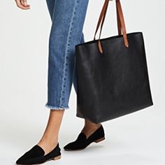 Madewell Transport Tote In Black/Brown. Made Of Vegetable-Tanned Leather That Burnishes With Wear Into A Beautiful Patina. Interior Zip Pocket. Unlined. 8 1/4” Handle Drop. 13 3/4” H X 14” W X 6 1/4” D. Used But Well Loved. Some Signs Of Wear Throughout (Pictured), Mostly Just Marks, But Still In Good Condition. Madewell Transport Tote, Madewell Bags, Classic Leather Tote, Vegetable Tanned Leather, Madewell, Leather Tote, Zip Pockets, Black And Brown, Bag Lady