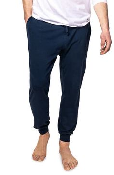 Sleep in supreme comfort with these buttery-soft pajama pants cut from pima cotton jersey designed to get softer wash after wash without fading. Drawstring waist 100% pima cotton Machine wash, dry flat Made in Peru Cotton Lounging Bottoms, Comfortable Cotton Sleep Pants, Cotton Bottoms For Lounging With Relaxed Fit, Cotton Pants With Elastic Waistband For Loungewear, Casual Sleep Pants With Elastic Waistband, Relaxed Fit Athleisure Sleepwear, Relaxed Fit Bottoms With Comfort Waistband For Lounging, Relaxed Fit Athleisure Sleepwear For Leisure, Relaxed Cotton Bottoms With Elastic Cuffs