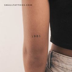 a woman with a small tattoo on her arm