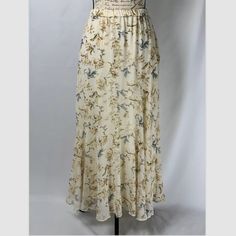 Drew Skirt Nwt Women’s Long Floral Lined Msrp $234 Size Small. Condition Is New With Tags. Waist 26” Stretchable Elastic Length 35” Elegant Tiered Cream Maxi Skirt, Chic Cream Floral Print Bottoms, Chic Cream Maxi Skirt With Ruffles, Chic Cream Ruffled Maxi Skirt, Spring Cream Flowy Maxi Skirt, Spring Flowy Cream Maxi Skirt, Cream Flowy Maxi Skirt For Spring, Chic Cream Maxi Skirt For Spring, Elegant Cream Maxi Skirt With Ruffles