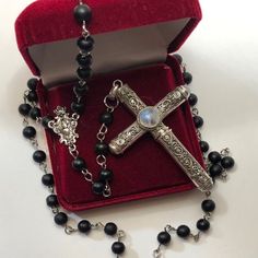 Each Cross Is Individually Handmade. The Pendants Are Crafted In .925 Sterling, And Embellished With A Selection Of Hand Polished Black Onyx Natural Gemstones. Cross Measures Approx. 2 3/4" X 1 3/4" ( You Can Design Your Own At My Website ) My Crosses Are Exclusively Designed And Modeled After The Stash Rosary So Famously Depicted In The Movie Cruel Intentions. The Sterling Silver Crosses Contain A Secret Compartment In The Bottom Portion Of The Pendant. When Opened, This Beauty Reveals A Master Cruel Intentions Necklace, Cross Necklace With Silver Beads For Gift, Elegant Sterling Silver Crucifix Rosary, Elegant Silver Crucifix Rosary, Elegant Silver Rosary As Gift, Elegant Sterling Silver Rosary With Cross, Black Crucifix Jewelry For Jewelry Making, Sterling Silver Crucifix Jewelry For Formal Occasion, Elegant Silver Crucifix Necklace