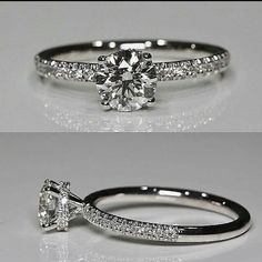 an engagement ring with a diamond on the side and a wedding band that is split in half