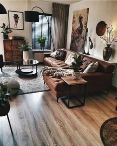 a living room filled with furniture and decor