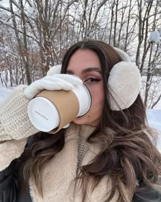 Girl sipping coffee, wearing earmuffs, gloves, winter coat, snow in the background , cold weather, curly hair Earmuffs Outfit, Photos Bff, Winter Princess, Shotting Photo, Winter Photoshoot, Snow Fashion, Winter Mood