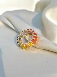 Rainbow Sapphire Ring, 14K Solid Gold, Multicolor Sapphire, Eternity Band Ring, Rainbow Gemstone Ring, Multicolor Band Ring, Gift For Her Diri Jewels 1. Material Details ✧ Gold KT: 14K Solid Gold ✧ Gold Color Options: Yellow Gold, White Gold, Rose Gold ✧ Gemstones: Natural Multi Sapphire (11.00 CTS - final carat weight will depend on ring size) ✧ Natural Diamonds: H-I VS-SI (0.75 CTS - final carat weight will depend on ring size) 2. Shipping & Packaging Details ☐ Dispatches in 4 - 8 business day Luxury Multicolor Cluster Ring As Gift, Sapphire Eternity Band, Rainbow Sapphires, Rainbow Gemstones, Snake Jewelry, Snake Earrings, Dope Jewelry, Eternity Band Ring, Funky Jewelry