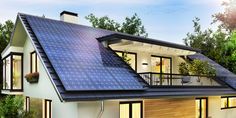 a house with a solar panel on the roof and some trees in the back ground