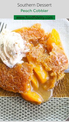 a close up of a plate of food with ice cream and peaches on it