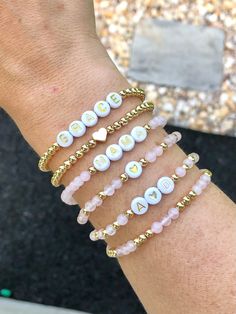 🔹 Design the custom bracelet stack that you have always wanted! These minimalist stacking bracelets can be personalized so you can get exactly what you want.🔹They are made with 4mm gemstone beads, 4mm 18k gold plated beads, 18k gold filled beads, sterling silver beads or rose gold beads and then strung together with a strong elastic cord.🔹EACH BRACLET IS ORDERED SEPARATELY. Please add each bracelet style separately to your cart. They will be sent to you as a stack. If you want all seven brace Rose Quartz Beaded Bracelet, Trendy Beaded Bracelets, Mama And Daughter, Beaded Name Bracelet, Beaded Bracelet Stack, Rose Quartz Bracelet Beads, Mama Bracelet, Name Bracelets, Rose Gold Beads