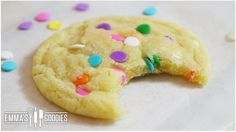 a cookie with sprinkles and confetti on it