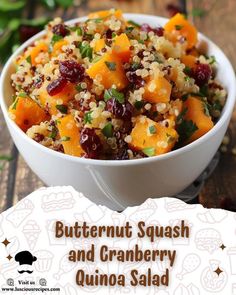 butternut squash and cranberry quinoa salad is shown in a white bowl