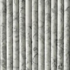 white marble wallpaper with vertical blinds in the background