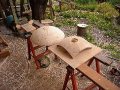 a wooden work bench being built in a garden