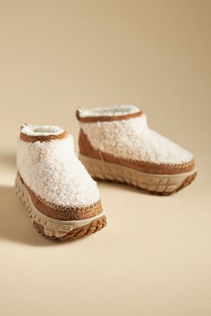 Upcycled wool, curly sheepskin upper Sugarcane EVA insole Rubber sole Pull-on styling Imported | Venture Daze Ultra Mini Cozy Boots by UGG in Beige, Women's, Size: Us 6/eu 38, Wool/Rubber/EVA at Anthropologie Cute Cozy Boots, Ugh Boot, Cutest Ugg Boots, Ugg Boot Slipper, Ugh Snow Boots, New Uggs 2024, Cozy Knit Uggs, Ugg Short Boots, Ugh Boots