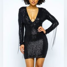 This Best Seller Black Pearl Beaded Dress Is A True Knockout This Deep V-Line Neck Plunges Into A Sea Of Beaded Sequins, Pearls And A Hint Of Metal Fringe. The Metallic Threads Are Black Tones But May Easily Be Paired With Gunmetal Or Antique Jewelry Sequins Dress Small Medium Large Pearl Dress Deep V-Neck Plunging Metal Fringe On Sleeves Mini Dress Stretch Lining Long Sleeves Back Zipper 48%Polyester 40%Pet 12%Spandex Fully Embellished Black Pearl Metallic Chain Long Sleeve Stunning Formal V Ne Glamorous Beaded Fringe Mini Dress For Night Out, Glamorous Mini Dress With Beaded Fringe For Night Out, Embellished V-neck Bodycon Party Dress, Glamorous Beaded Fringe Night Out Dress, Glamorous Beaded Fringe Dress For Night Out, Glamorous Beaded Fringe Dress For Date Night, Beaded Fringe Dress For Party Season Night Out, Elegant Mini Dress With Beaded Fringe For Night Out, Cocktail Mini Dress With Beaded Fringe