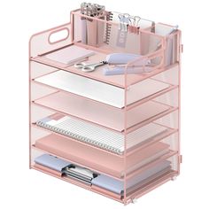 a pink desk organizer with drawers and office supplies