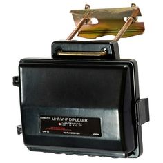 an electronic device is attached to the back of a black box with two metal handles