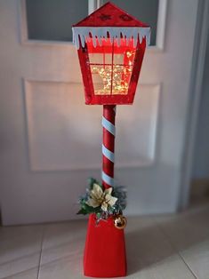 a red and white light up christmas decoration