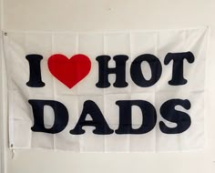 i love hot dads banner hanging on the wall