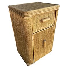 a wicker basket with two drawers on the bottom and one drawer at the top