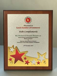 an award plaque with stars on it