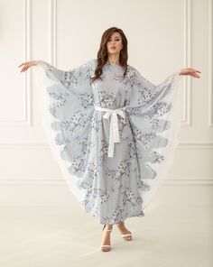 Introducing our Grey Print Kaftan embellished with exquisite white lace details. This kaftan, featuring a charming grey print, is elevated by the delicate lace trim, adding a touch of sophistication to your ensemble. Perfect for lounging in luxury or making a stylish statement at any gathering. ✓ garment length - 135 cm/53'' ✓ loose fit ✓ tie is included Material Composition: polyester 97%, elastane 3%.  Model is 176 cm/69.3'' tall and wears size XS/S. Arabian Abaya, Kaftan Lace, Eid Abaya, Abaya For Women, Dress Abaya, Dubai Abaya, Kaftan Abaya, Muslim Dress, Stocking Fillers For Her