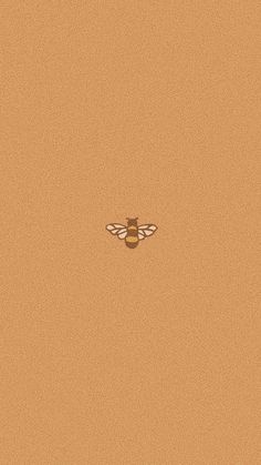 a brown background with a bee on it