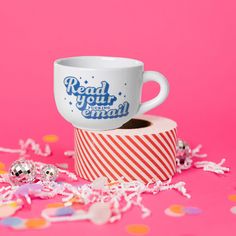 On a hot pink background sits a mug on top of a red and white striped packing tape with white crinkle and big, colorful confetti scattered around. There are mini disco balls. This white mug says Read your fucking email in a really cool retro lettering. It is in grey and blue and has blue stars scattered around the lettering. Funny Mug Designs, Etsy Inspiration, Holiday Mug, Funny Mug, Funny Mugs, Mug Designs, Coffee Tea, Tea Cups, Bundles