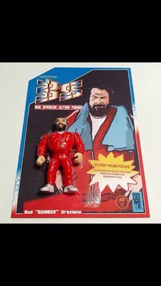 an action figure is shown in the packaging for this toy, which features a man with a beard and red suit