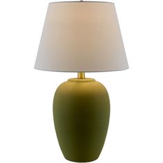 a green table lamp with a white shade