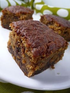 two pieces of cake on a white plate