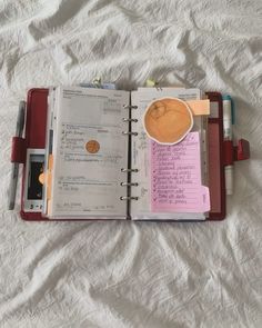 an open notebook with some writing on it