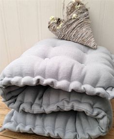 two pillows stacked on top of each other