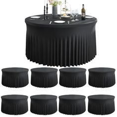 an image of a table set up with wine glasses and bottles on it for a party