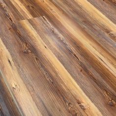 wood flooring that looks like it has been made from planks and is very hard to