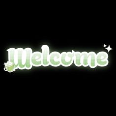 the word welcome is lit up in green and white with a cup on it's side