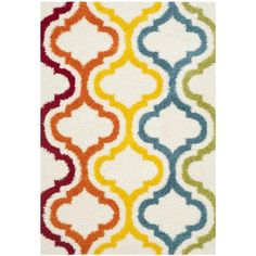 an area rug with different colors and shapes on it, including the pattern in red, yellow, blue, green, orange