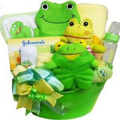 a green basket filled with stuffed animals and baby items