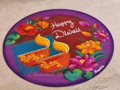 a happy diwali greeting card with colorful flowers and candles on it's surface