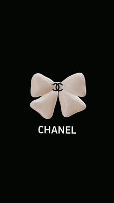 the chanel logo is shown on a black background with white bows in front of it